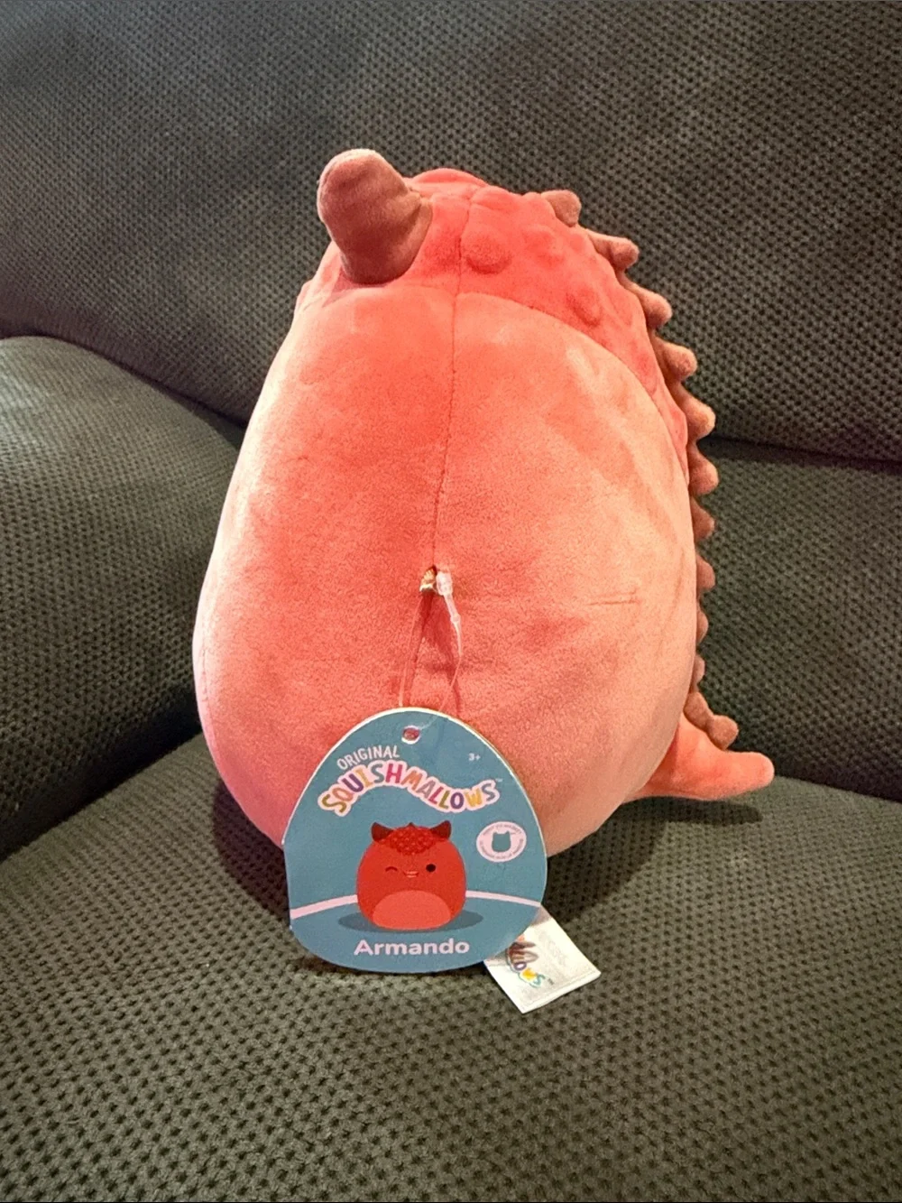Squishmallows Armando Carnotaraus Plush Winking dinosaur